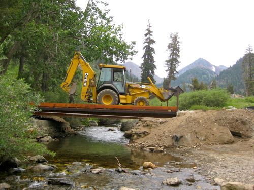 Huge yellow machine on Mineral King Bridge photo by Michael Botkin