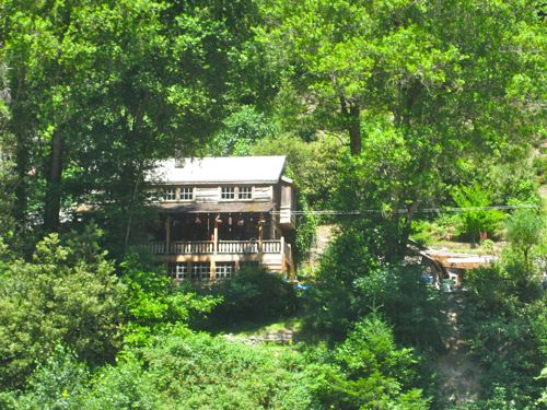 a cabin along the banks of the Rogue River