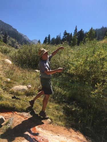 Trail Guy throwing rocks at Soda Springs 