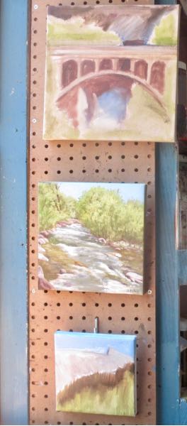 Kaweah Post Office oil painting hanging upside down by the windows